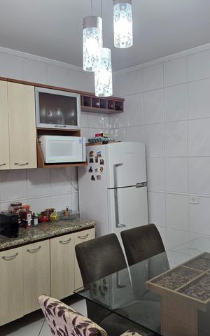Casa à venda com 100m², 2 quartos e 1 vaga Casa à venda com 100m², 2 quartos e 1 vagaCozinha