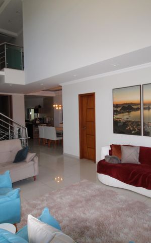 Casa de condomínio para alugar com 285m², 3 quartos e 4 vagasSala 1