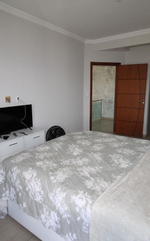 Casa de condomínio para alugar com 285m², 3 quartos e 4 vagasSuíte 1