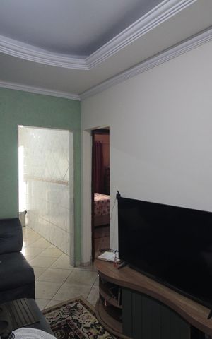 Casa à venda com 100m², 2 quartos e 2 vagasSala