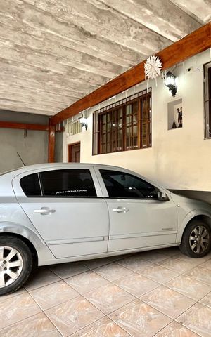 Casa à venda com 150m², 4 quartos e 3 vagas Casa à venda com 150m², 4 quartos e 3 vagasGaragem