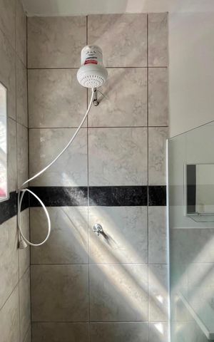 Casa à venda com 200m², 3 quartos e 3 vagas Casa à venda com 200m², 3 quartos e 3 vagasBanheiro da Suíte 2