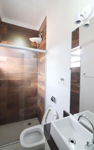Casa à venda com 180m², 3 quartos e 2 vagasQuarto 2 - Suíte Banheiro 