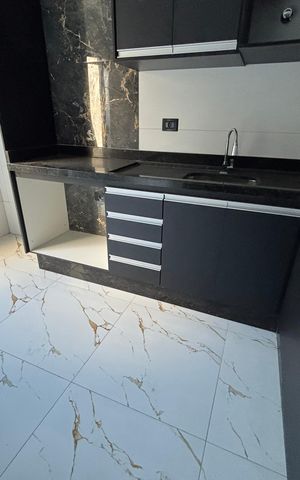 Apartamento à venda com 45m², 2 quartos e 1 vaga Apartamento à venda com 45m², 2 quartos e 1 vagaCozinha - Armários