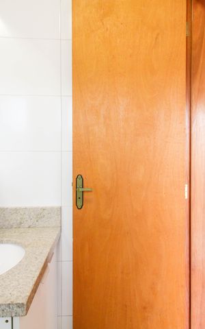 Casa à venda com 107m², 2 quartos e 2 vagas Casa à venda com 107m², 2 quartos e 2 vagasBanheiro da Suíte 1