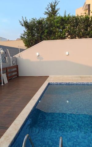Casa de condomínio para alugar com 300m², 4 quartos e 4 vagas