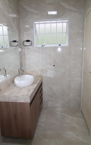 Casa para alugar com 100m², 3 quartos e 3 vagasBanheiro da Suíte