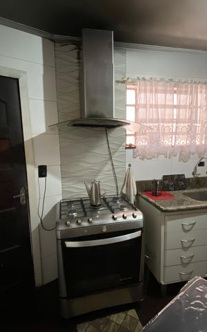 Casa à venda com 142m², 4 quartos e 2 vagas Casa à venda com 142m², 4 quartos e 2 vagasCozinha