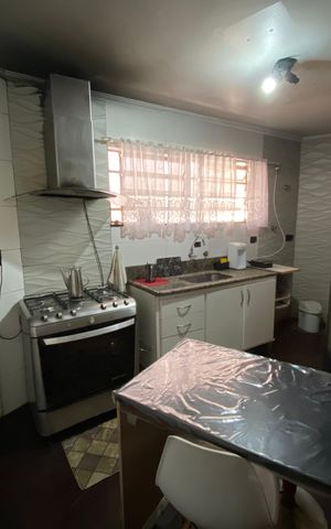 Casa à venda com 142m², 4 quartos e 2 vagas Casa à venda com 142m², 4 quartos e 2 vagasCozinha