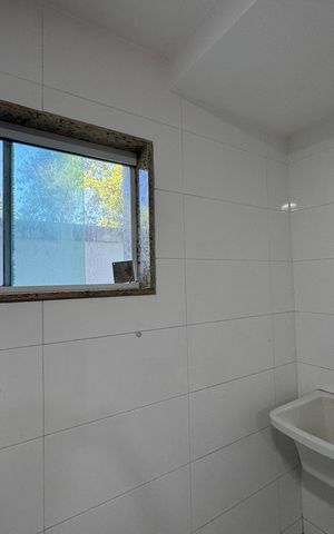 Casa à venda com 151m², 3 quartos e 2 vagas Casa à venda com 151m², 3 quartos e 2 vagasCozinha e Área de Serviço