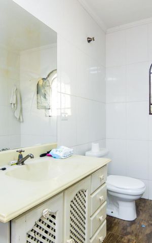 Casa à venda com 200m², 3 quartos e 2 vagasBanheiro da Suíte 1
