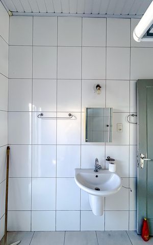 Casa à venda com 60m², 4 quartos e sem vagaBanheiro 1
