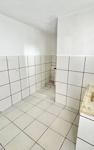 Casa à venda com 50m², 2 quartos e sem vaga Casa à venda com 50m², 2 quartos e sem vagaCozinha e Área de Serviço