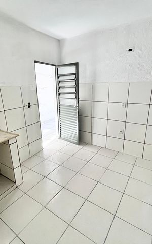 Casa à venda com 50m², 2 quartos e sem vaga Casa à venda com 50m², 2 quartos e sem vagaCozinha e Área de Serviço