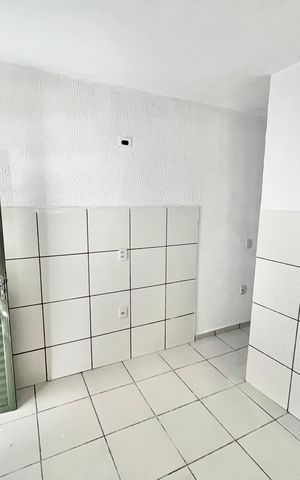 Casa à venda com 50m², 2 quartos e sem vaga Casa à venda com 50m², 2 quartos e sem vagaCozinha e Área de Serviço