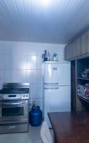 Casa à venda com 140m², 6 quartos e 3 vagas Casa à venda com 140m², 6 quartos e 3 vagasCozinha