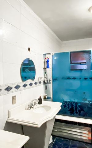 Casa à venda com 490m², 4 quartos e 2 vagas Casa à venda com 490m², 4 quartos e 2 vagasBanheiro da Suíte 1