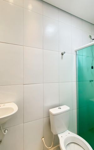 Casa de condomínio à venda com 52m², 2 quartos e 1 vaga Casa de condomínio à venda com 52m², 2 quartos e 1 vagaBanheiro da Suíte 1