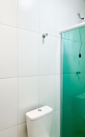 Casa de condomínio à venda com 52m², 2 quartos e 1 vaga Casa de condomínio à venda com 52m², 2 quartos e 1 vagaBanheiro da Suíte 1