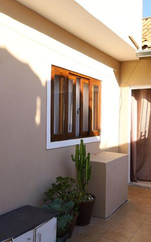 Casa à venda com 75m², 1 quarto e 2 vagasQuintal 