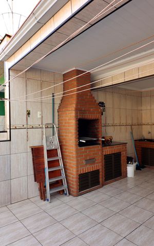 Casa à venda com 120m², 3 quartos e 1 vagaÁrea de Serviço e Espaço Gourmet 