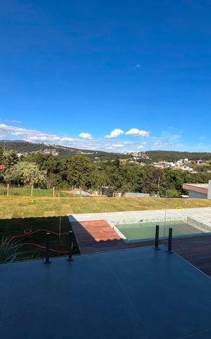 Casa de condomínio à venda com 230m², 3 quartos e 4 vagas Casa de condomínio à venda com 230m², 3 quartos e 4 vagasÁrea externa