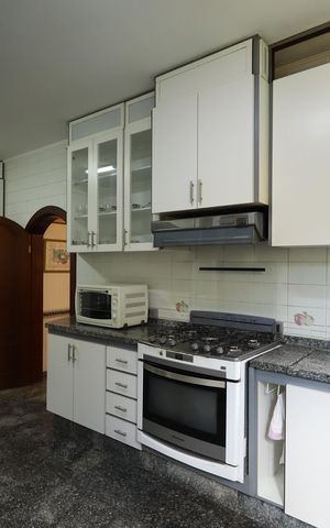 Casa de condomínio para alugar com 853m², 4 quartos e 8 vagasCozinha