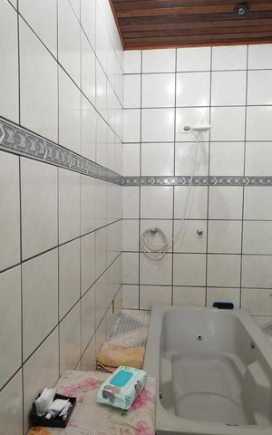 Casa à venda com 212m², 3 quartos e 2 vagasBanheiro da Suíte 1