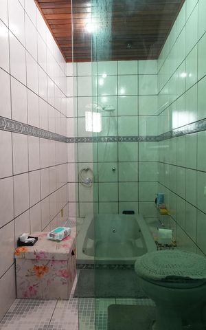 Casa à venda com 212m², 3 quartos e 2 vagasBanheiro da Suíte 1