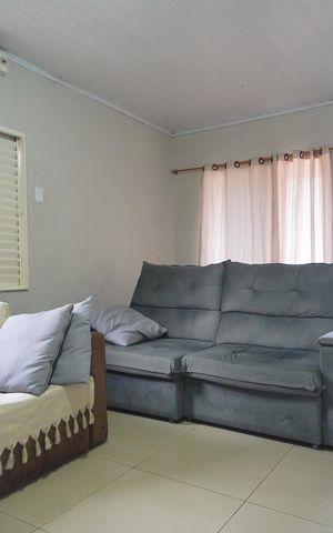 Casa à venda com 100m², 3 quartos e 2 vagasSala