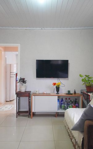 Casa à venda com 100m², 3 quartos e 2 vagasSala