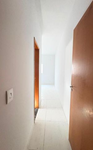 Casa à venda com 83m², 2 quartos e 2 vagas Casa à venda com 83m², 2 quartos e 2 vagasCorredor