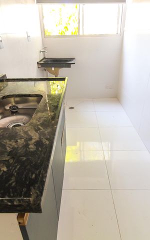 Apartamento à venda com 40m², 2 quartos e 1 vaga Apartamento à venda com 40m², 2 quartos e 1 vagaCozinha e Área de Serviço