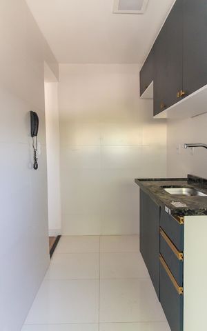 Apartamento à venda com 40m², 2 quartos e 1 vaga Apartamento à venda com 40m², 2 quartos e 1 vagaCozinha e Área de Serviço