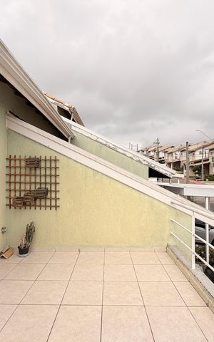 Casa de condomínio à venda com 111m², 3 quartos e 3 vagasVaranda