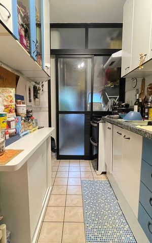 Apartamento para alugar com 48m², 2 quartos e 1 vaga Apartamento para alugar com 48m², 2 quartos e 1 vagaCozinha e Área de Serviço