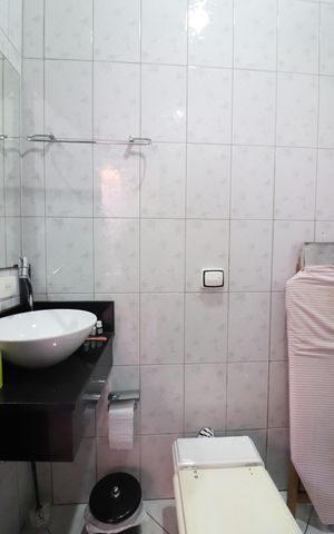 Casa à venda com 210m², 3 quartos e 4 vagasBanheiro de serviço