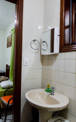 Casa à venda com 340m², 6 quartos e 4 vagasBanheiro do quarto de hóspedes 