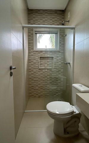 Casa de condomínio para alugar com 195m², 4 quartos e 2 vagasBanheiro Suíte 1