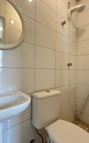 Casa de condomínio para alugar com 195m², 4 quartos e 2 vagasBanheiro área de serviço 