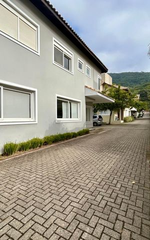 Casa de condomínio para alugar com 195m², 4 quartos e 2 vagasFachada