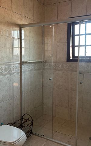 Casa de condomínio à venda com 290m², 3 quartos e 2 vagasBanheiro