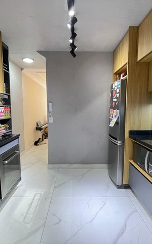 Casa à venda com 110m², 2 quartos e 2 vagas Casa à venda com 110m², 2 quartos e 2 vagasCozinha