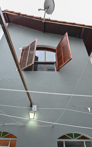 Casa à venda com 125m², 3 quartos e 2 vagasFachada Posterior