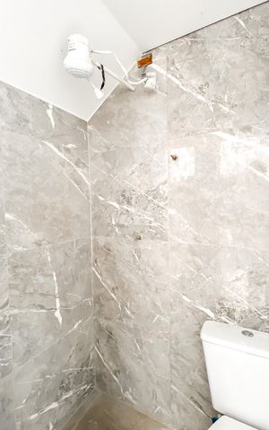 Casa à venda com 118m², 3 quartos e 4 vagasBanheiro de serviço