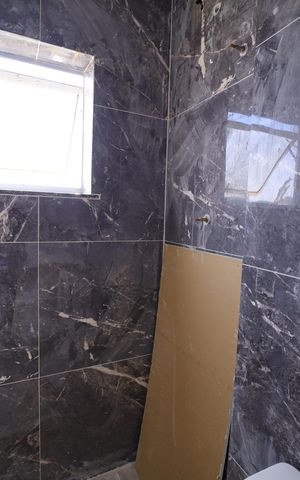 Casa à venda com 118m², 3 quartos e 4 vagasBanheiro do Quarto 1