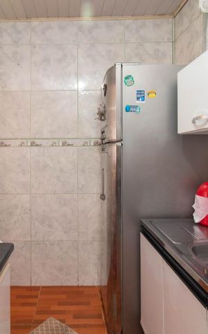 Casa de condomínio à venda com 48m², 2 quartos e 1 vaga Casa de condomínio à venda com 48m², 2 quartos e 1 vagaCozinha