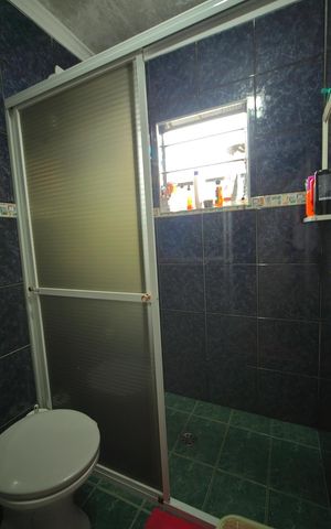 Casa à venda com 200m², 3 quartos e 2 vagasBanheiro da Suíte 