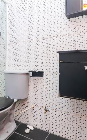 Casa à venda com 100m², 3 quartos e sem vagaBanheiro da Suíte