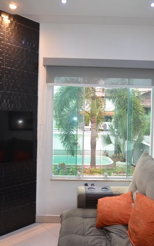 Casa à venda com 154m², 3 quartos e 2 vagasSala de TV